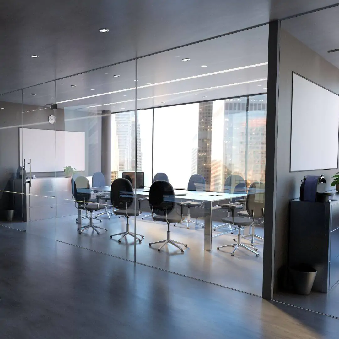 A pristine modern conference room with glass walls, black chairs around a white table, and a large window overlooking the city skyline.